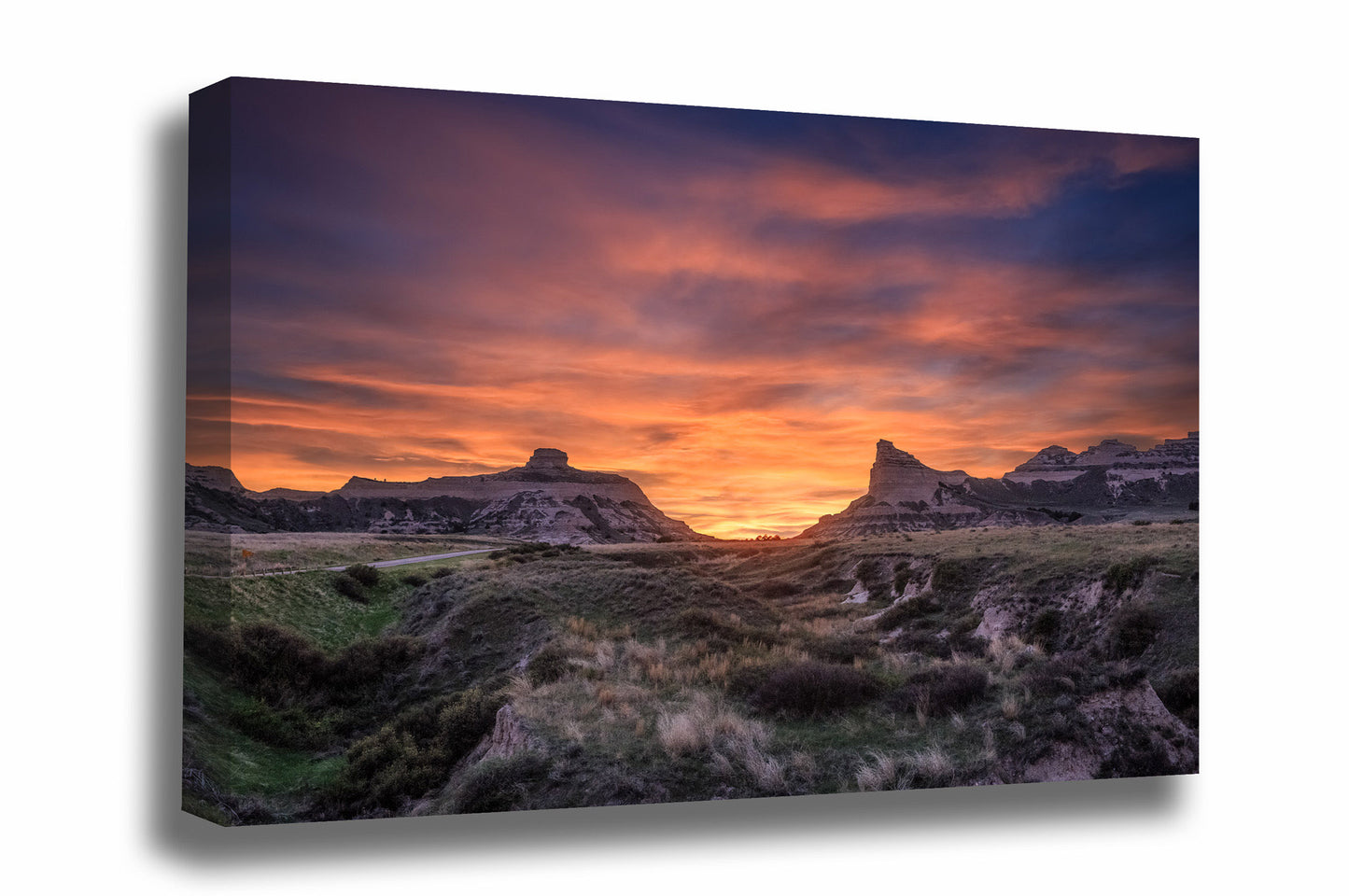 Prairie gallery wrapped canvas wall art of a vivid sunset taking place over Scotts Bluff National Monument near Scottsbluff, Nebraska by Sean Ramsey of Southern Plains Photography.