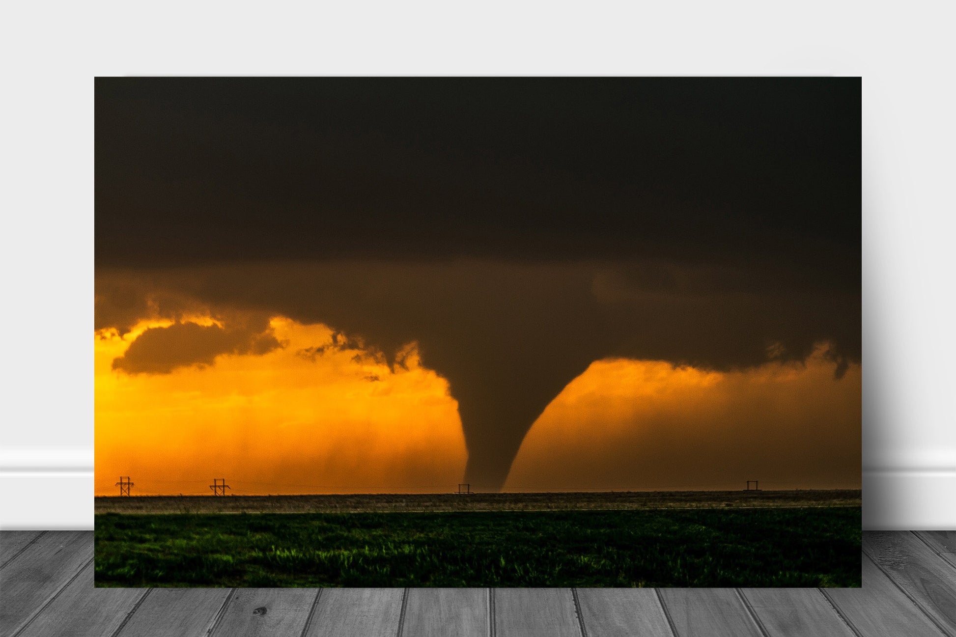 Storm metal print of a large tornado appearing as a silhouette against the evening sky in Kansas by Sean Ramsey of Southern Plains Photography.