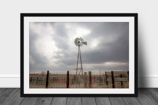 Framed and matted Midwest print of an old windmill standing against a stormy sky on a spring day in Iowa by Sean Ramsey of Southern Plains Photography.