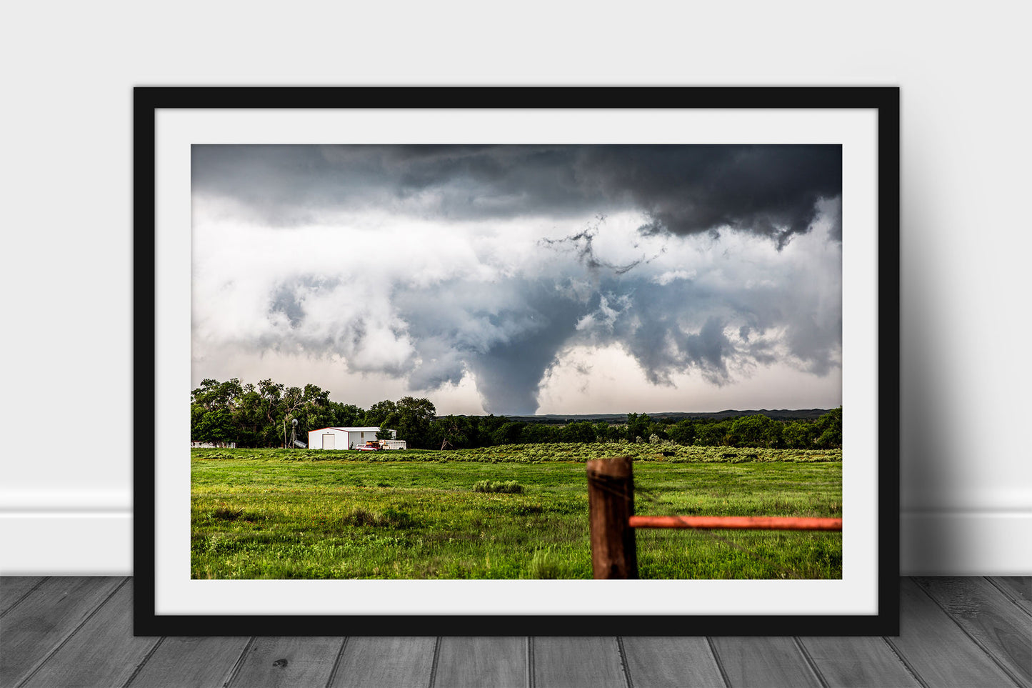Framed and matted extreme weather print of a large tornado rumbling over the landscape on a stormy day in the Texas Panhandle by Sean Ramsey of Southern Plains Photography.