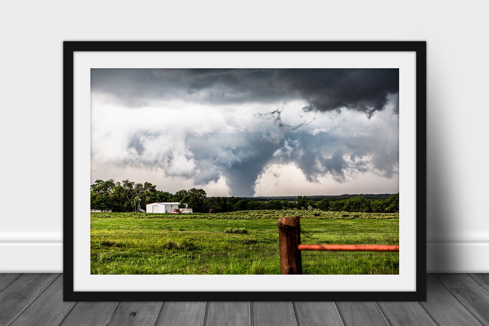 Framed and matted extreme weather print of a large tornado rumbling over the landscape on a stormy day in the Texas Panhandle by Sean Ramsey of Southern Plains Photography.