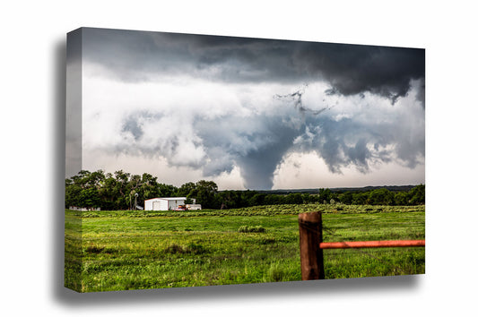 Extreme weather canvas wall art of a large tornado rumbling over the landscape on a stormy day in the Texas Panhandle by Sean Ramsey of Southern Plains Photography.