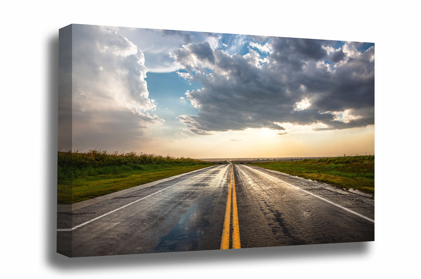 Road gallery wrapped canvas wall art of a rain soaked highway going on forever as golden sunlight begins to fill the sky after a stormy day in Oklahoma by Sean Ramsey of Southern Plains Photography.