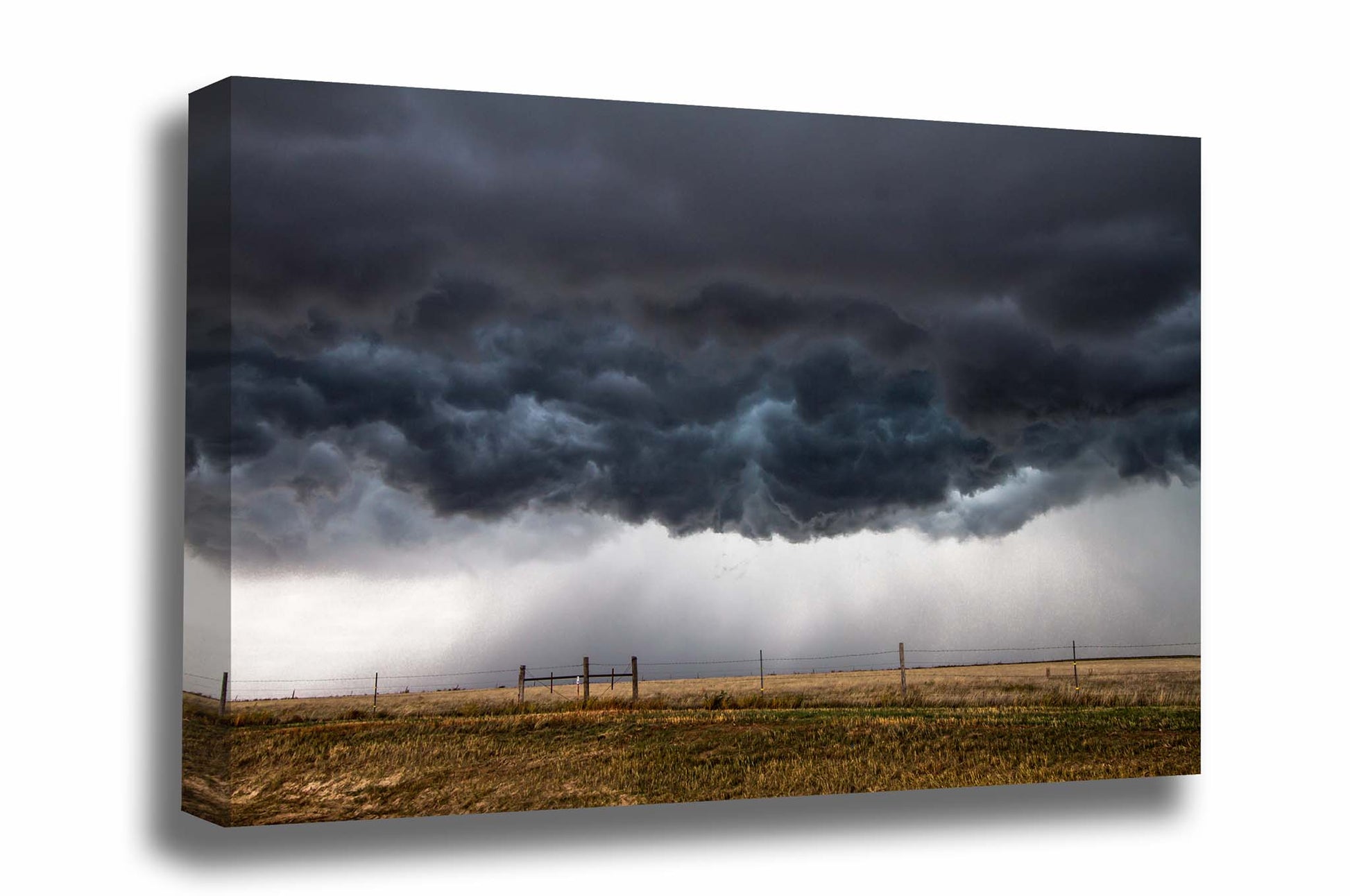Thunderstorm gallery wrapped canvas wall art of low hanging storm clouds boiling over plains n a stormy day in Kansas by Sean Ramsey of Southern Plains Photography.