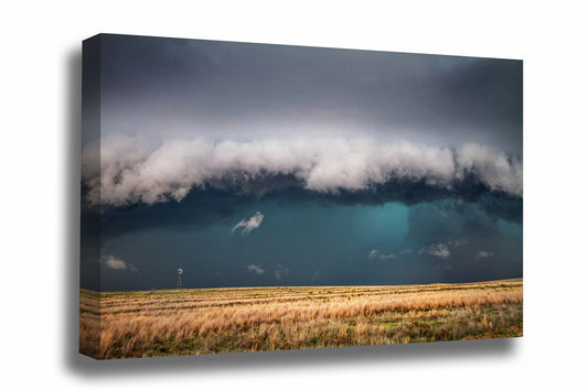 Thunderstorm canvas wall art of a storm engulfing a windmill on a stormy day on the open plains of Texas by Sean Ramsey of Southern Plains Photography.