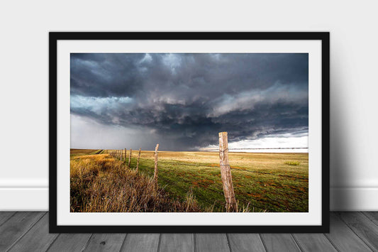 Framed print with optional mat of a powerful thunderstorm taking on a gentle appearance over a barbed wire fence on a stormy spring day in the Texas Panhandle by Sean Ramsey of Southern Plains Photography.