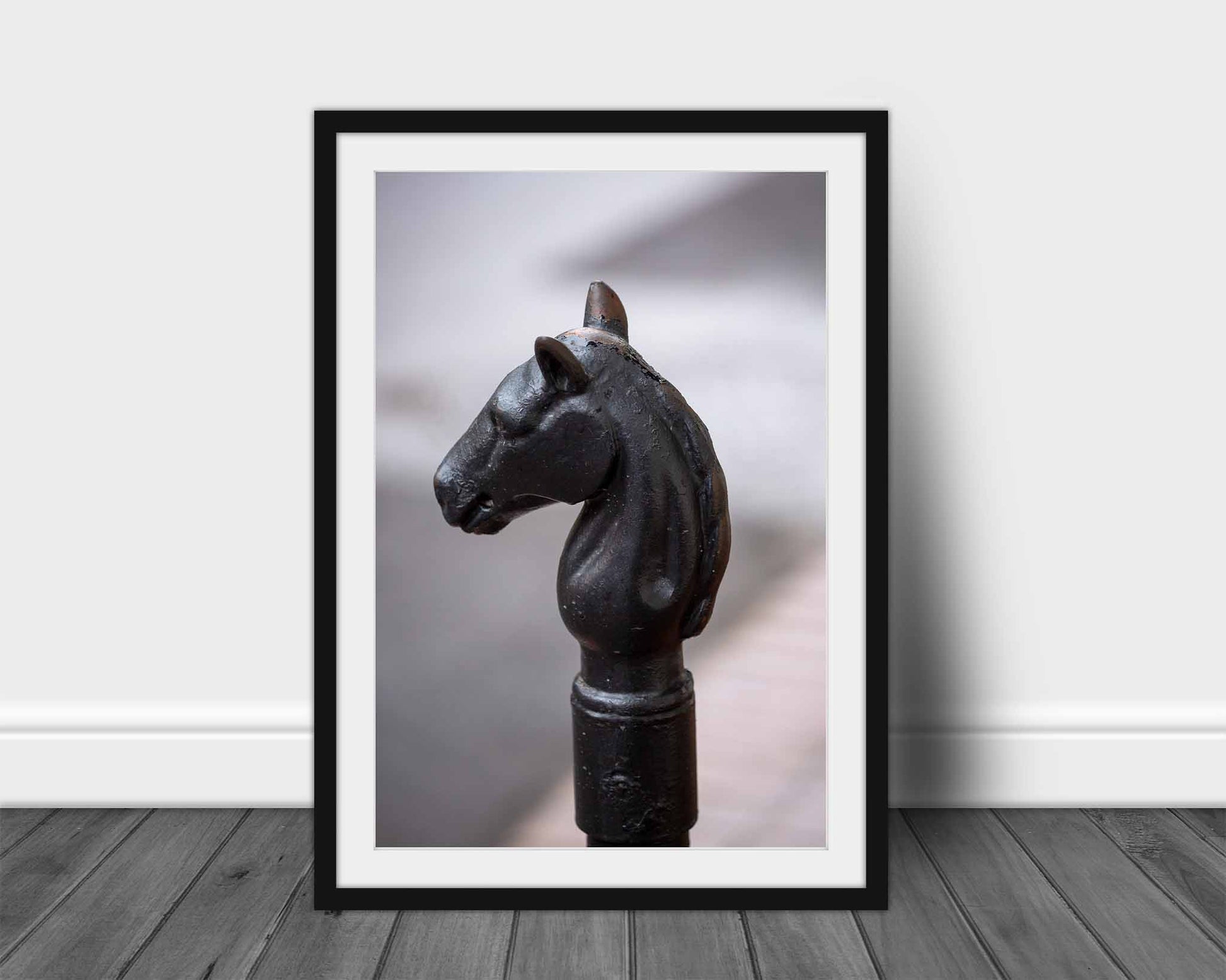 Victorian style vertical framed print of a horse head hitching post in the French Quarter of New Orleans, Louisiana by Sean Ramsey of Southern Plains Photography.