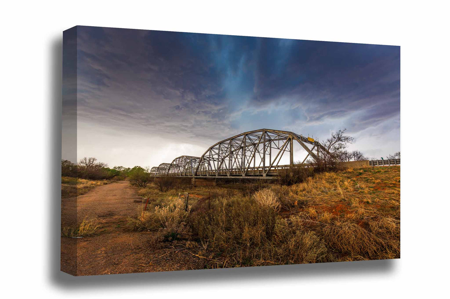 Storm gallery wrapped canvas wall art of an aqua colored thunderstorm over and old bridge in the Texas Panhandle by Sean Ramsey of Southern Plains Photography.
