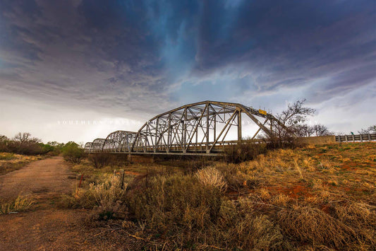 Storm photography print of an aqua colored thunderstorm over and old bridge in the Texas Panhandle by Sean Ramsey of Southern Plains Photography.