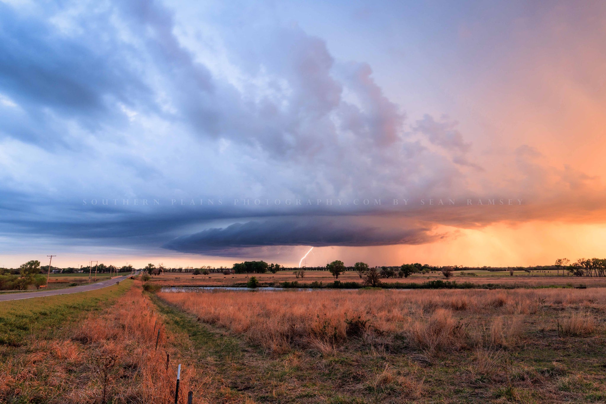 Storm photography print of a supercell thunderstorm with lightning bolt on a stormy spring evening in Kansas by Sean Ramsey of Southern Plains Photography.