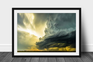 Framed and matted storm photography print of a supercell thunderstorm backlit by sunlight filling the sky on a stormy spring day in Oklahoma by Sean Ramsey of Southern Plains Photography.