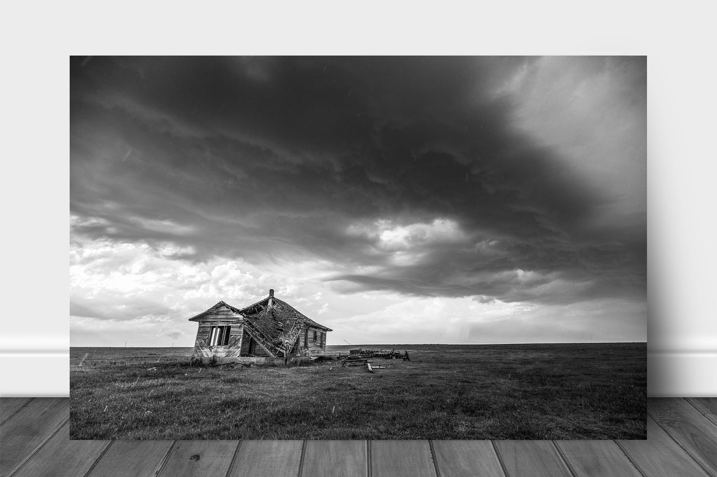 Black and white abandoned house aluminum metal print wall art of an old homestead under an advancing thunderstorm on a stormy day on the open plains of Oklahoma by Sean Ramsey of Southern Plains Photography.