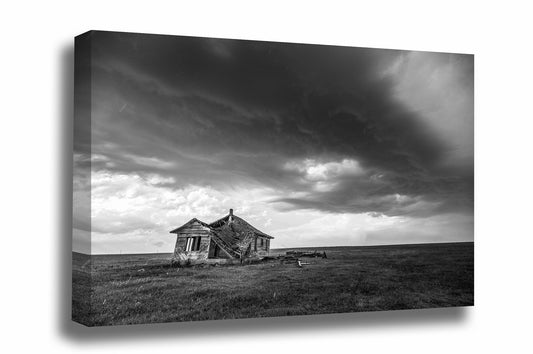 Black and white abandoned house gallery wrapped canvas wall art of an old homestead under an advancing thunderstorm on a stormy day on the open plains of Oklahoma by Sean Ramsey of Southern Plains Photography.
