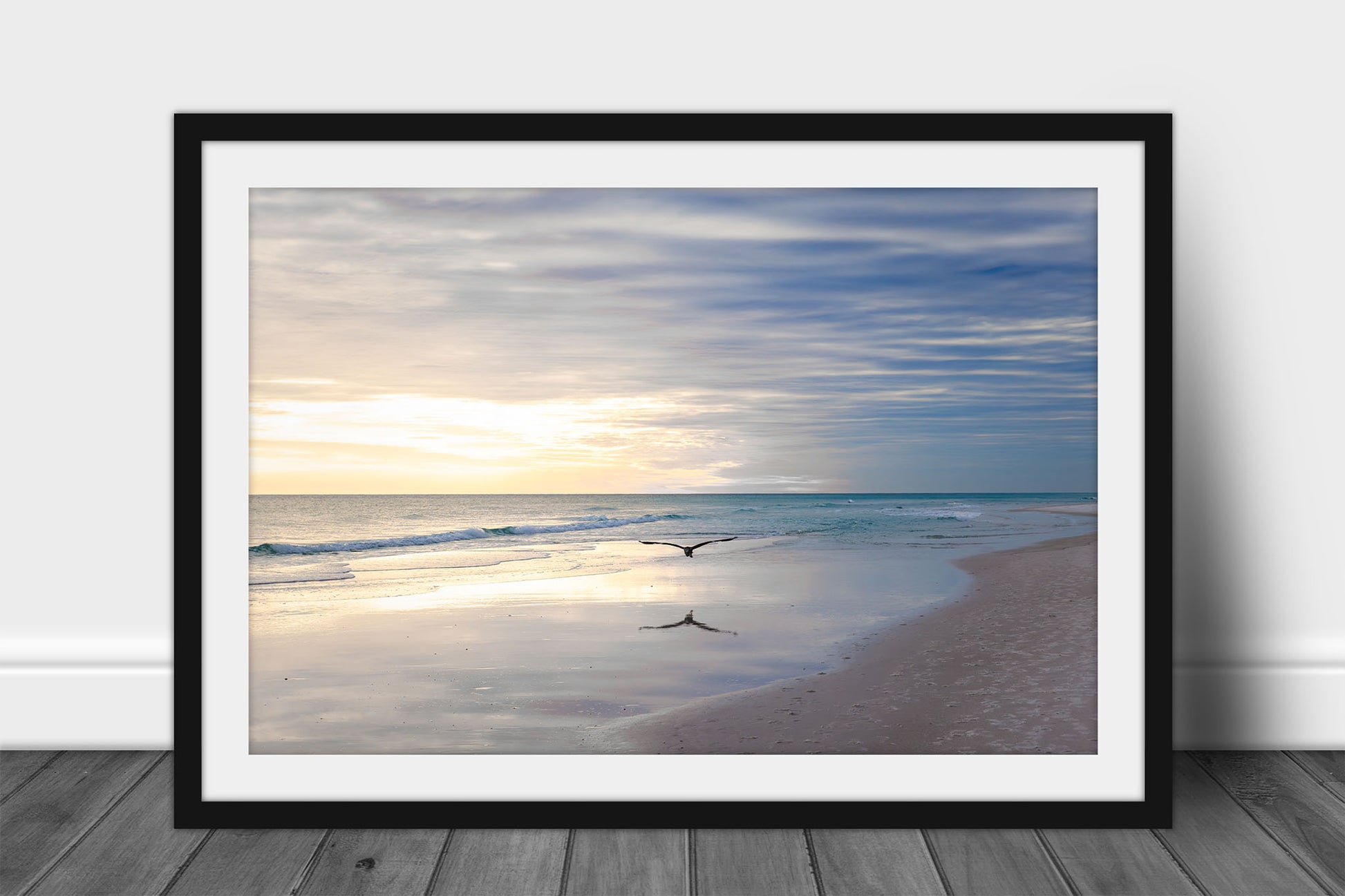 Framed Gulf Coast print of a sea bird flying over waves at Pensacola Beach, Florida by Sean Ramsey of Southern Plains Photography.