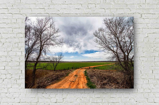 Country metal print of a dirt road leading to a field and memories of life on the farm in Oklahoma by Sean Ramsey of Southern Plains Photography.