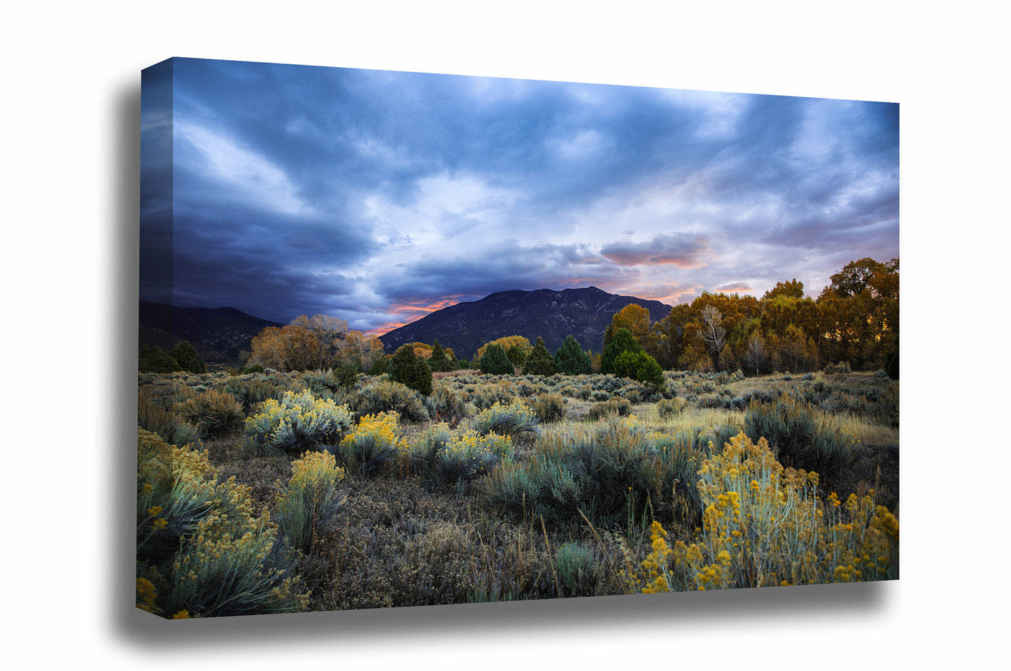 Rocky Mountain landscape gallery wrapped canvas wall art of Taos Mountain under a stormy sky at sunrise on an autumn morning near Taos, New Mexico by Sean Ramsey of Southern Plains Photography.