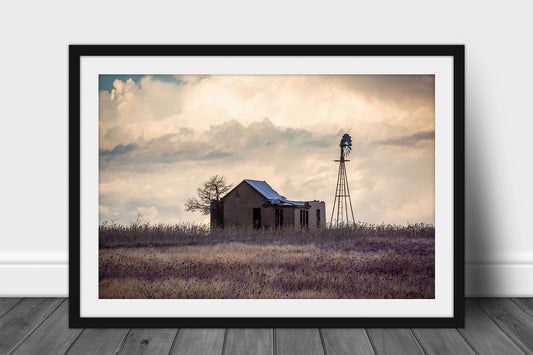 Framed and matted prairie print of an abandoned house and windmill in a field with a stormy sky backdrop in Oklahoma by Sean Ramsey of Southern Plains Photography.