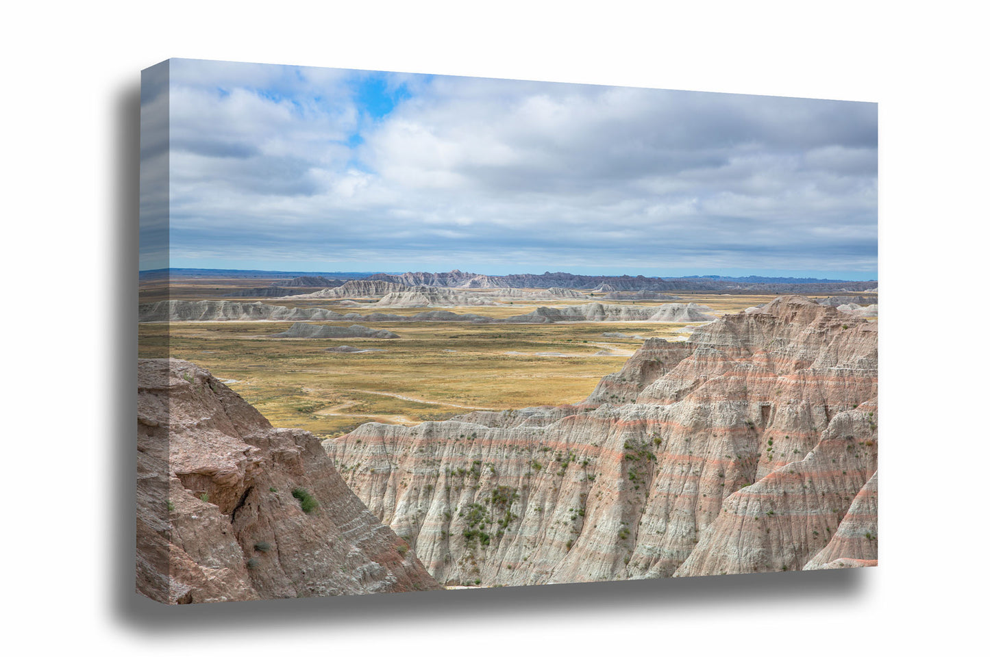Great Plains gallery wrapped canvas wall art of Badlands National Park rising from the vast expansive northern prairie in South Dakota by Sean Ramsey of Southern Plains Photography.