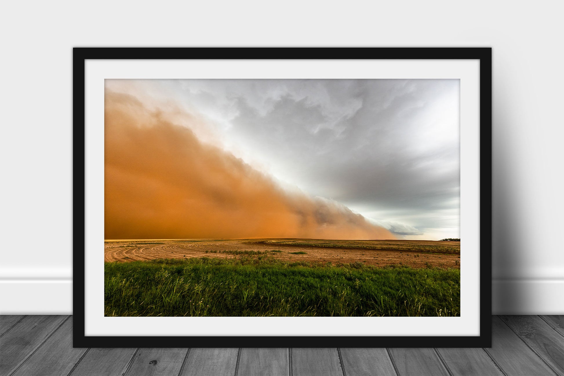 Framed and matted haboob print of a dust storm sweeping over a field on a stormy spring day on the plains of Texas by Sean Ramsey of Southern Plains Photography.