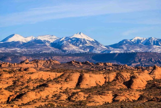 La Sal Mountains photography print of snowy peaks overlooking the desert landscape of Arches National Park near Moab, Utah by Sean Ramsey of Southern Plains Photography.
