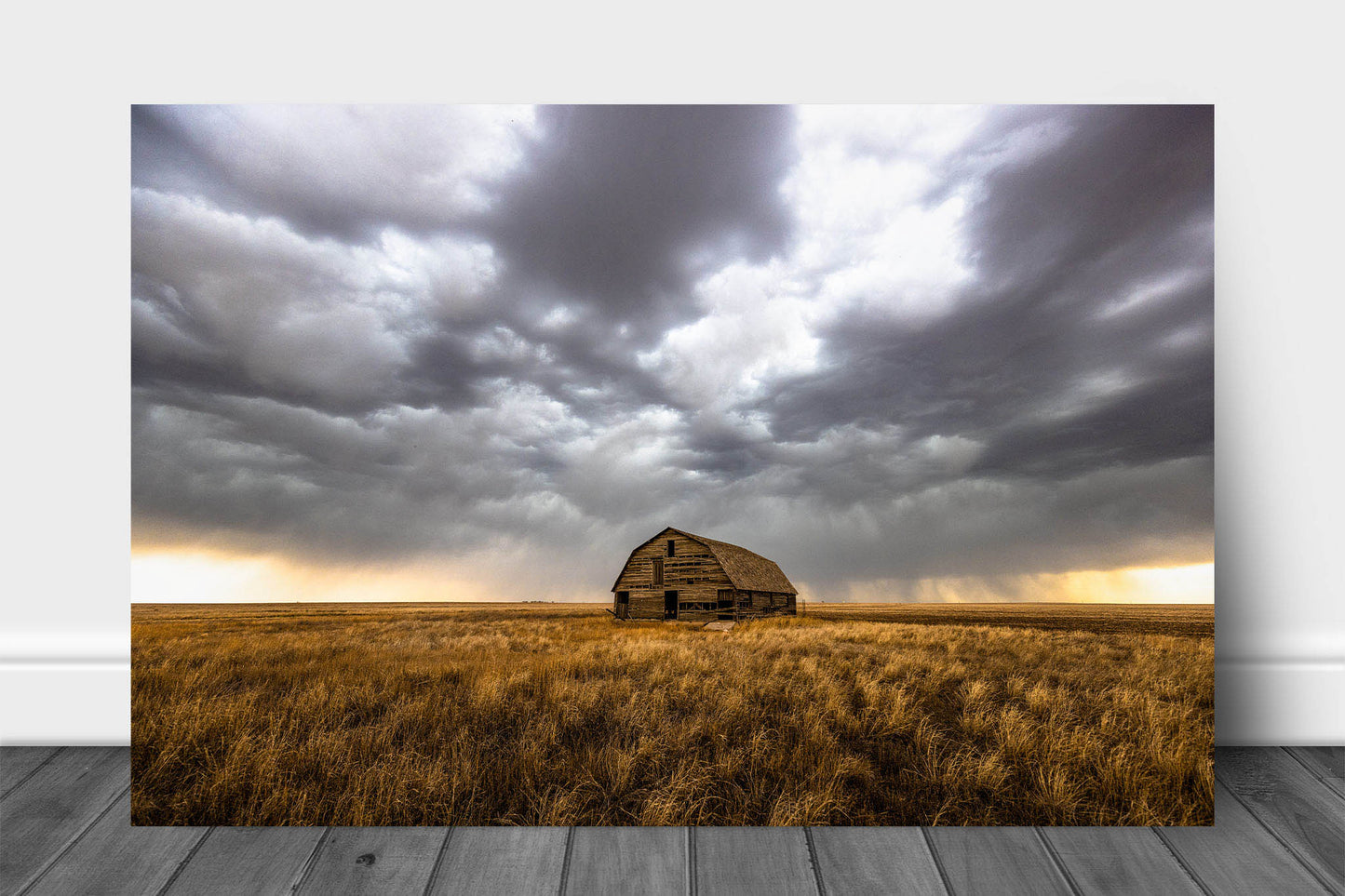 Great Plains aluminum metal print wall art of an old barn nestled in golden prairie grass under a stormy sky on a spring day in Oklahoma by Sean Ramsey of Southern Plains Photography.