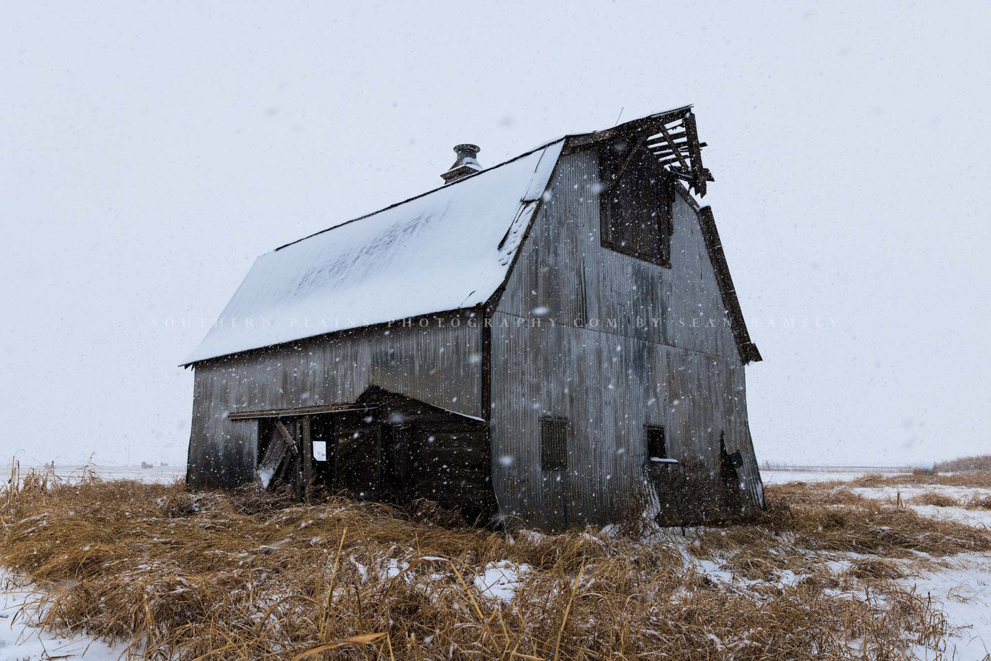 Country photography print of an old barn on a snowy winter day in Oklahoma by Sean Ramsey of Southern Plains Photography.