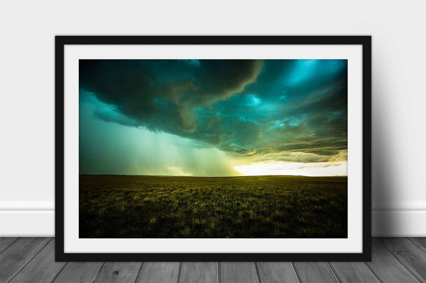 Framed and matted storm print of a thunderstorm advancing over open prairie on a stormy late summer day in Nebraska by Sean Ramsey of Southern Plains Photography.