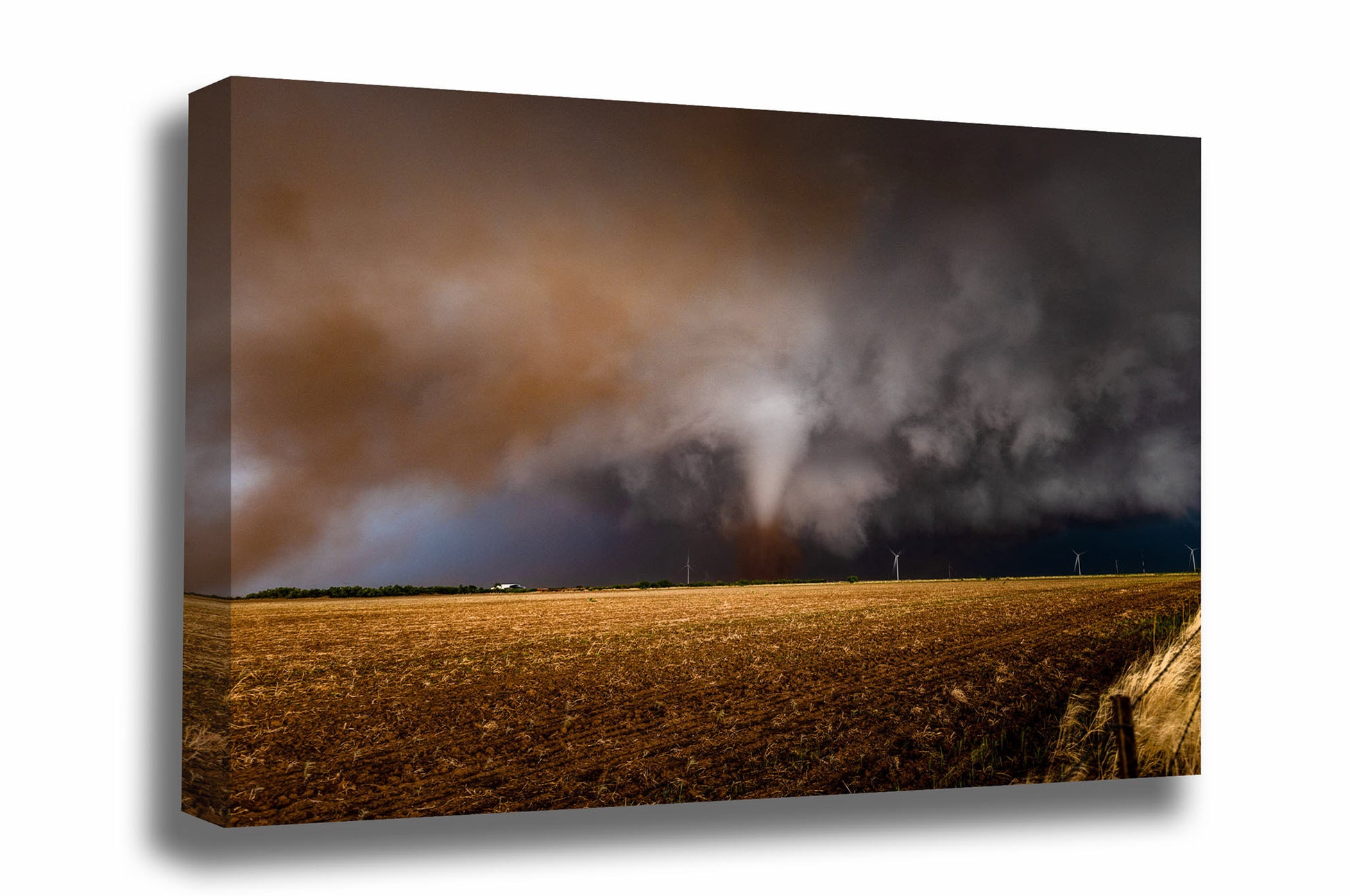 Storm canvas wall art of a tornado churning up dirt as it passes through a field on a stormy spring day in Texas by Sean Ramsey of Southern Plains Photography.