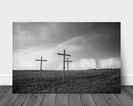 Spiritual black and white metal print on aluminum of three wooden crosses on a stormy day in Texas by Sean Ramsey of Southern Plains Photography.