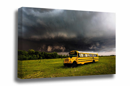 Storm canvas wall art of a thunderstorm advancing over an old school bus in a field on a stormy spring day in Oklahoma by Sean Ramsey of Southern Plains Photography.