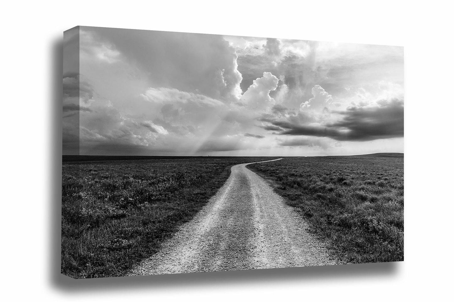 Black and white Great Plains canvas wall art of a dirt road leading through the prairie as storm clouds brew in the Flint Hills of Kansas by Sean Ramsey of Southern Plains Photography.