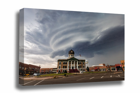 Storm gallery wrapped canvas wall art of a striated supercell thunderstorm advancing over the Washita County courthouse in Cordell, Oklahoma by Sean Ramsey of Southern Plains Photography.