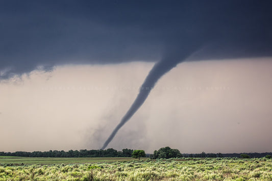 Extreme weather photography print of a tornado twisting over open prairie on a stormy day in Oklahoma by Sean Ramsey of Southern Plains Photography.