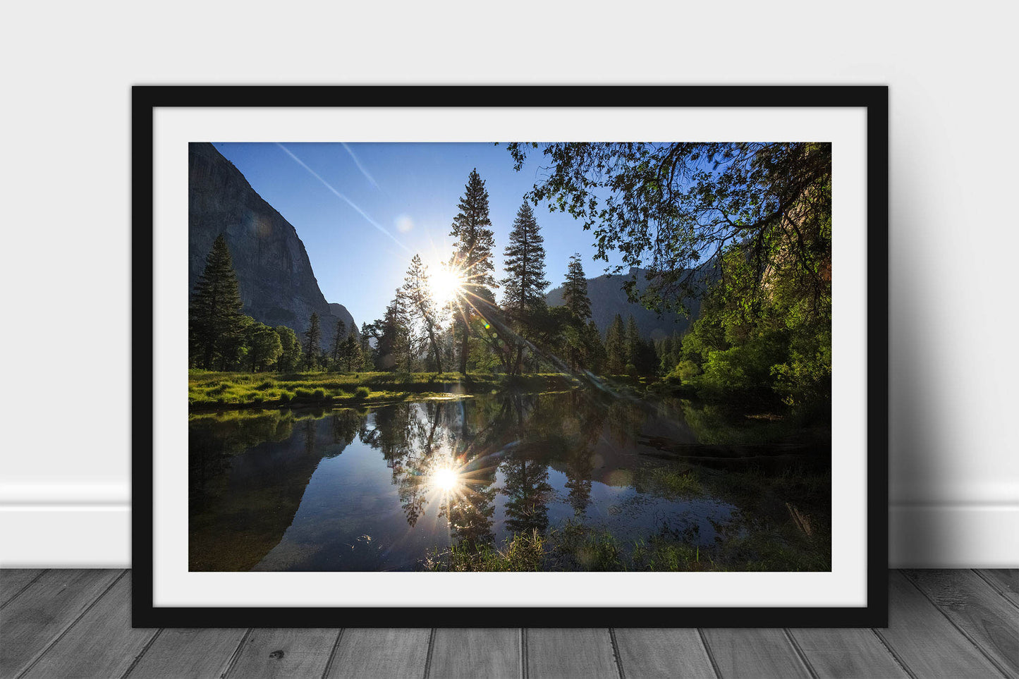 Framed and matted nature print of the sun reflecting off the waters of the Merced River on a peaceful summer morning in Yosemite National Park, California by Sean Ramsey of Southern Plains Photography.