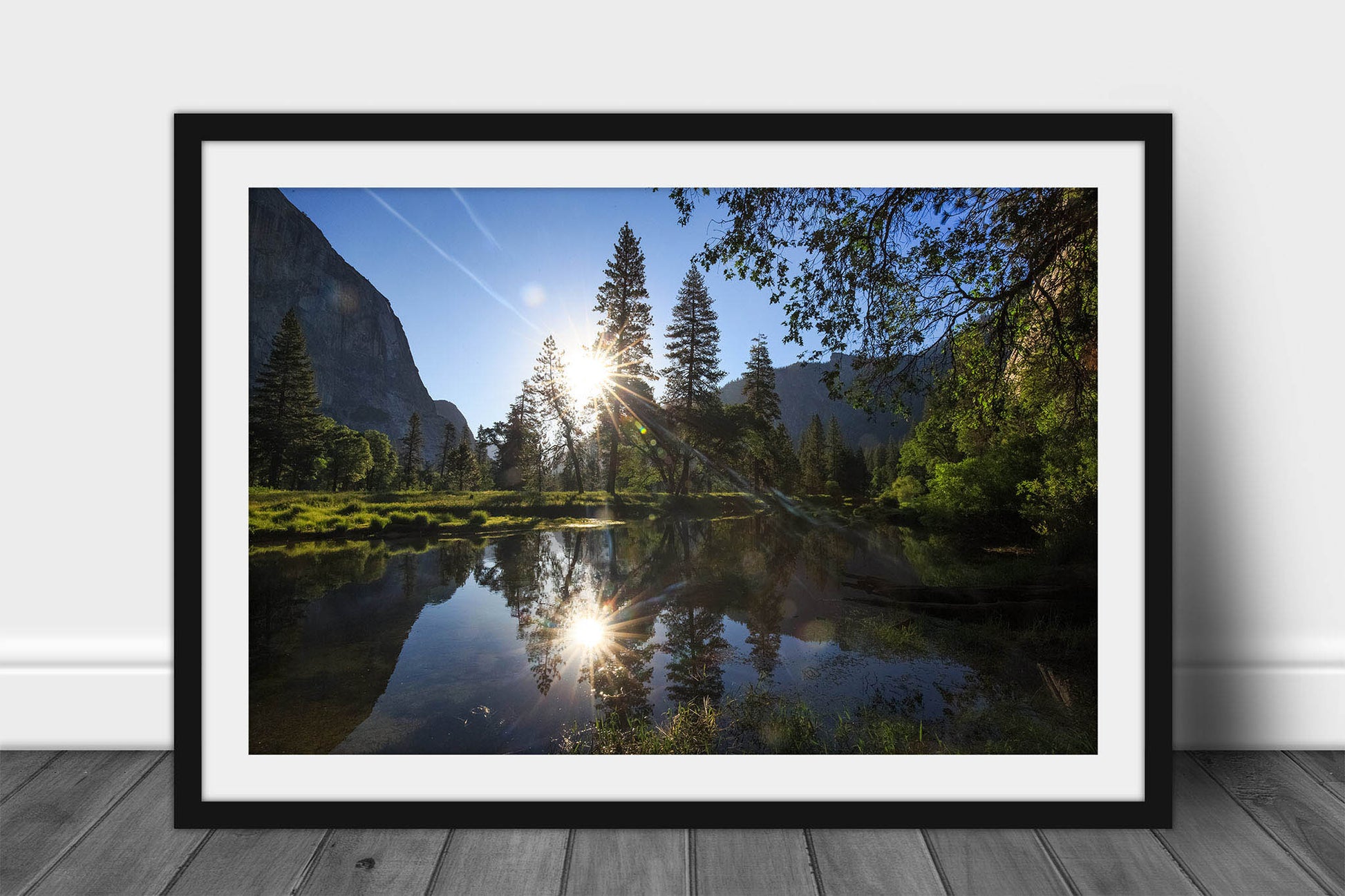 Framed and matted nature print of the sun reflecting off the waters of the Merced River on a peaceful summer morning in Yosemite National Park, California by Sean Ramsey of Southern Plains Photography.