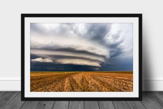 Framed and matted storm print of a supercell thunderstorm shelf cloud over an open field on a stormy day in Kansas by Sean Ramsey of Southern Plains Photography.
