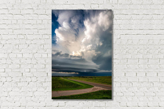 Vertical metal print of a supercell thunderstorm with a tall updraft over a highway on a stormy spring day in Kansas by Sean Ramsey of Southern Plains Photography.
