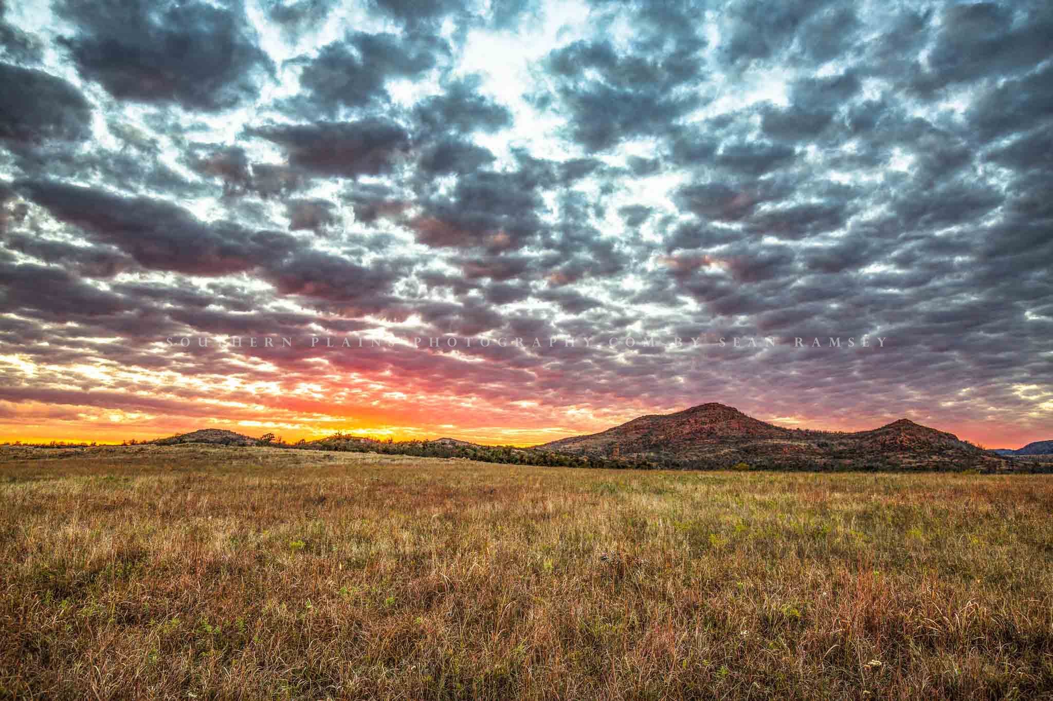 Landscape photography print of a warm sunset over the Wichita Mountains in southwest Oklahoma by Sean Ramsey of Southern Plains Photography.