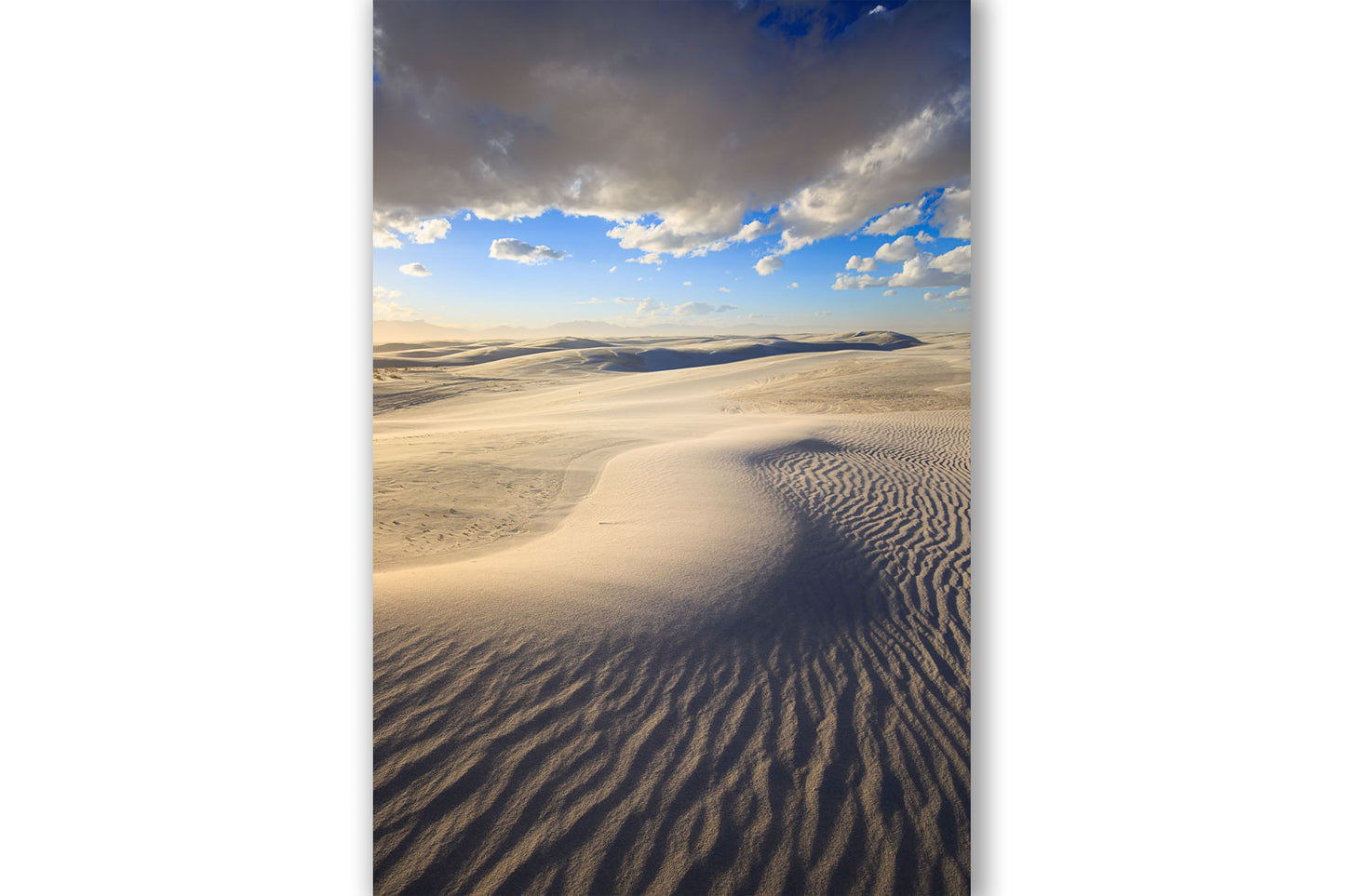 Desert southwest vertical photography print of shifting sand dunes in White Sands National Park, New Mexico by Sean Ramsey of Southern Plains Photography.