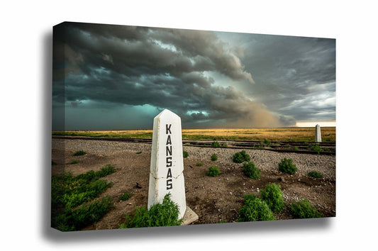 Great Plains canvas wall art of a storm advancing past railroad posts on a spring day at the state line of Kansas by Sean Ramsey of Southern Plains Photography.