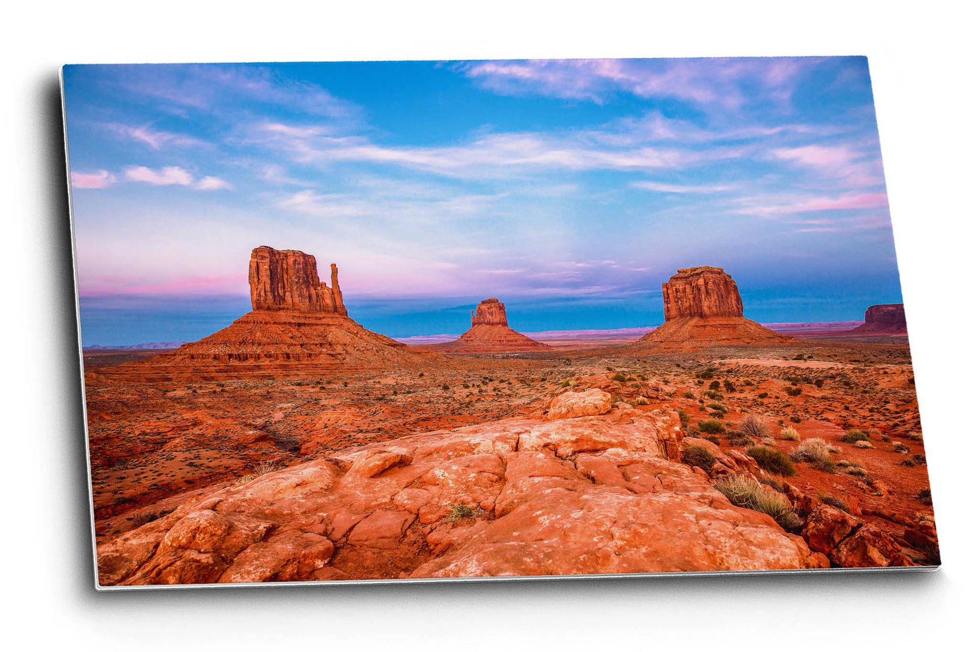Western landscape metal print of the Mittens under a scenic sky at sunset in Monument Valley along the Arizona and Utah border by Sean Ramsey of Southern Plains Photography.