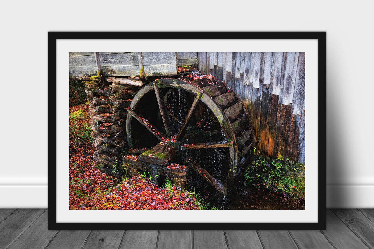 Rustic country framed print of an old grist mill wheel covered in fallen leaves on an autumn day in the Great Smoky Mountains of Tennessee by Sean Ramsey of Southern Plains Photography.