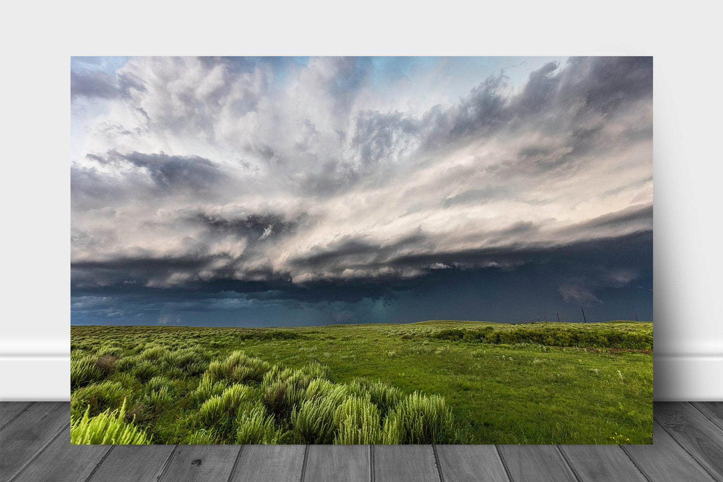 Great Plains aluminum metal print wall art of a thunderstorm filling the sky with dramatic storm clouds over prairie on a spring day in Oklahoma by Sean Ramsey of Southern Plains Photography.