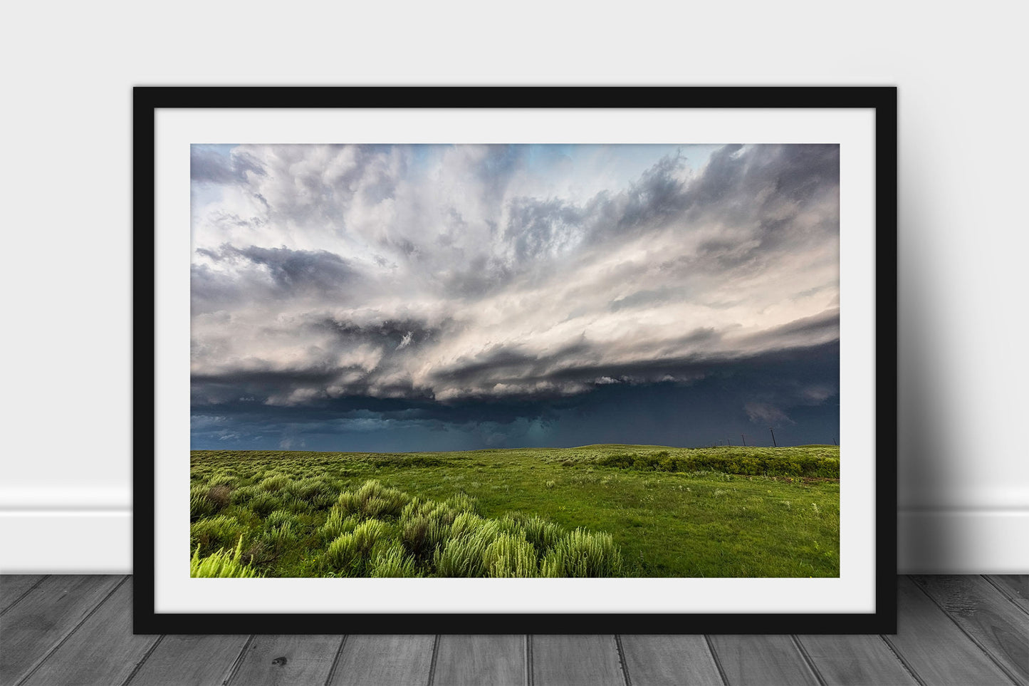 Great Plains framed print of a thunderstorm filling the sky with dramatic storm clouds over prairie on a spring day in Oklahoma by Sean Ramsey of Southern Plains Photography.