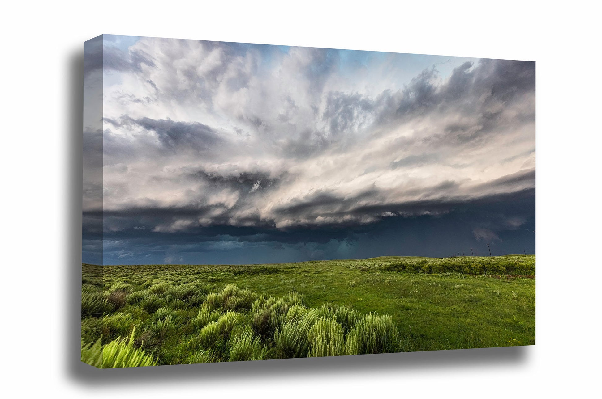 Great Plains gallery wrapped canvas wall art of a thunderstorm filling the sky with dramatic storm clouds over prairie on a spring day in Oklahoma by Sean Ramsey of Southern Plains Photography.