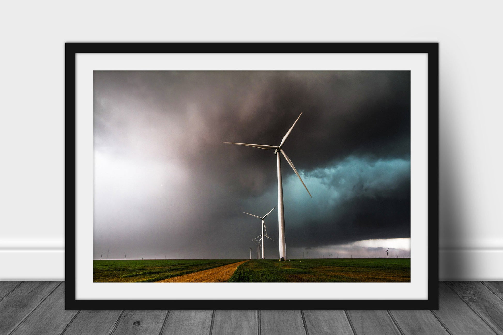 Framed wind farm print of wind turbines churning through an intense thunderstorm on a stormy spring day in the Texas panhandle by Sean Ramsey of Southern Plains Photography.