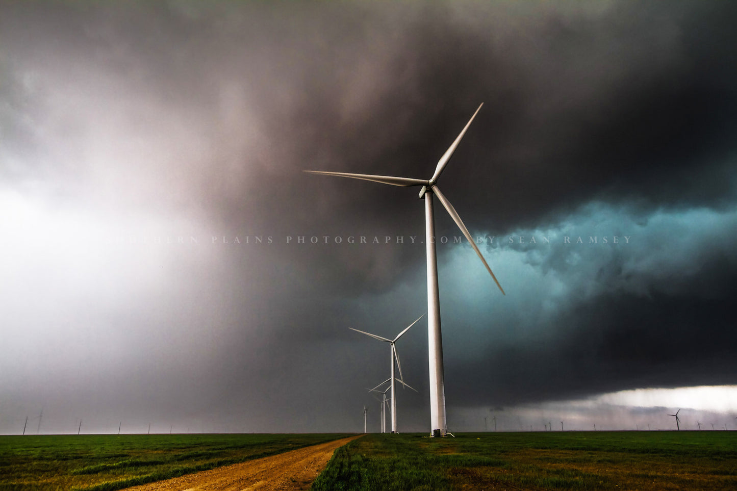 Storm photography print of wind turbines churning through an intense thunderstorm on a spring day in the Texas panhandle by Sean Ramsey of Southern Plains Photography.