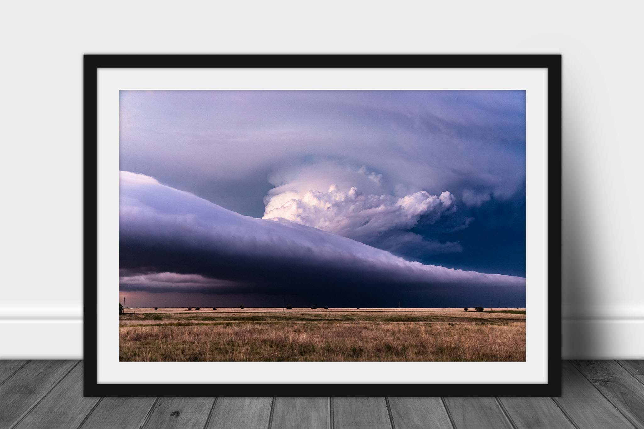 Framed and matted storm print of a supercell thunderstorm spanning the horizon as it climbs high into the sky on a stormy spring day in Texas by Sean Ramsey of Southern Plains Photography.