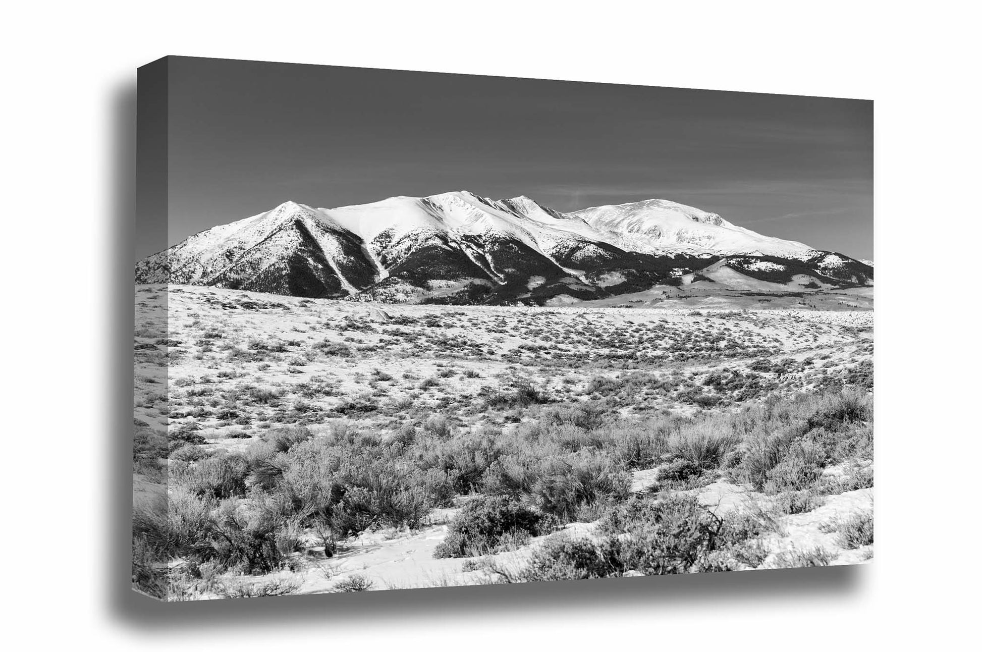 Black and White Rocky Mountains gallery wrapped canvas wall art of Mount Elbert overlooking a snowy landscape on a winter day in Colorado by Sean Ramsey of Southern Plains Photography.
