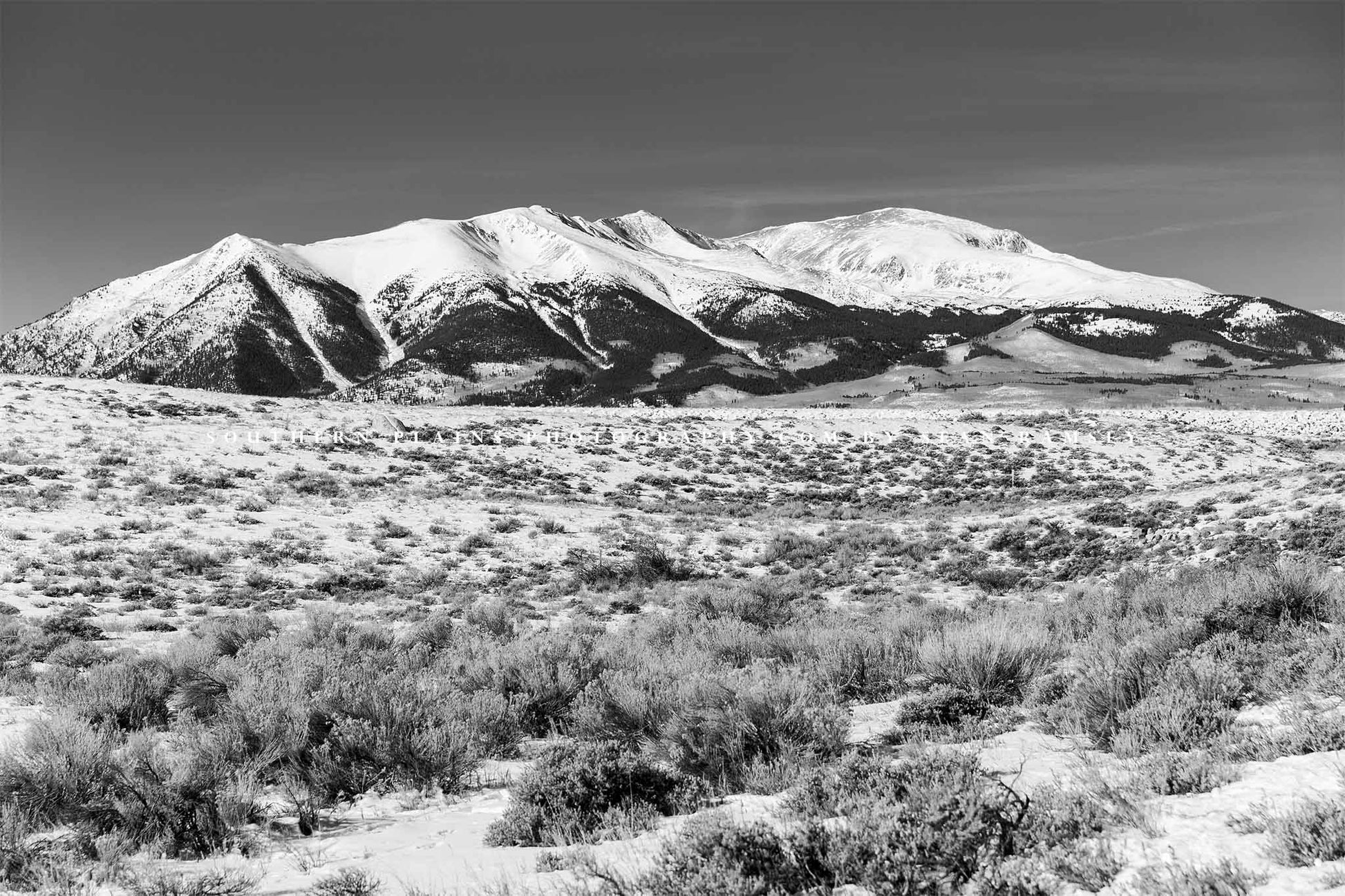 Black and White Rocky Mountains photography print of Mount Elbert overlooking a snowy landscape on a winter day in Colorado by Sean Ramsey of Southern Plains Photography.